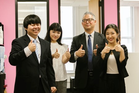 successful online job portal applicants showing thumbs up after securing desired careers
